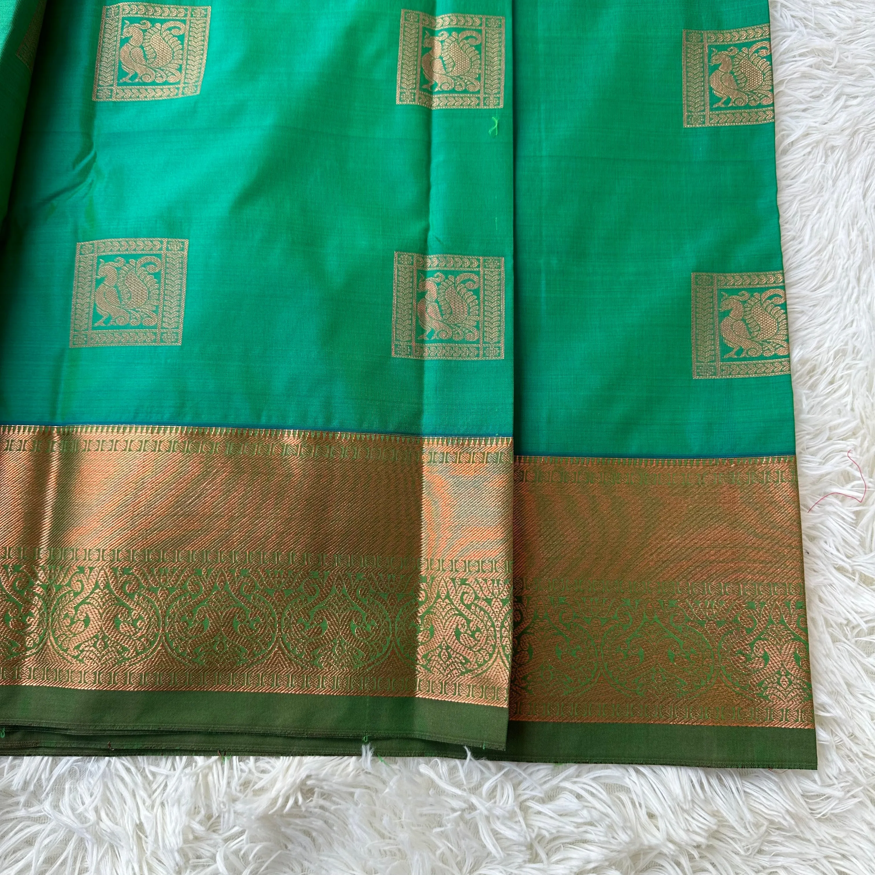 The Harmony Emerald Green Semi Silk Saree  With Meroon Border