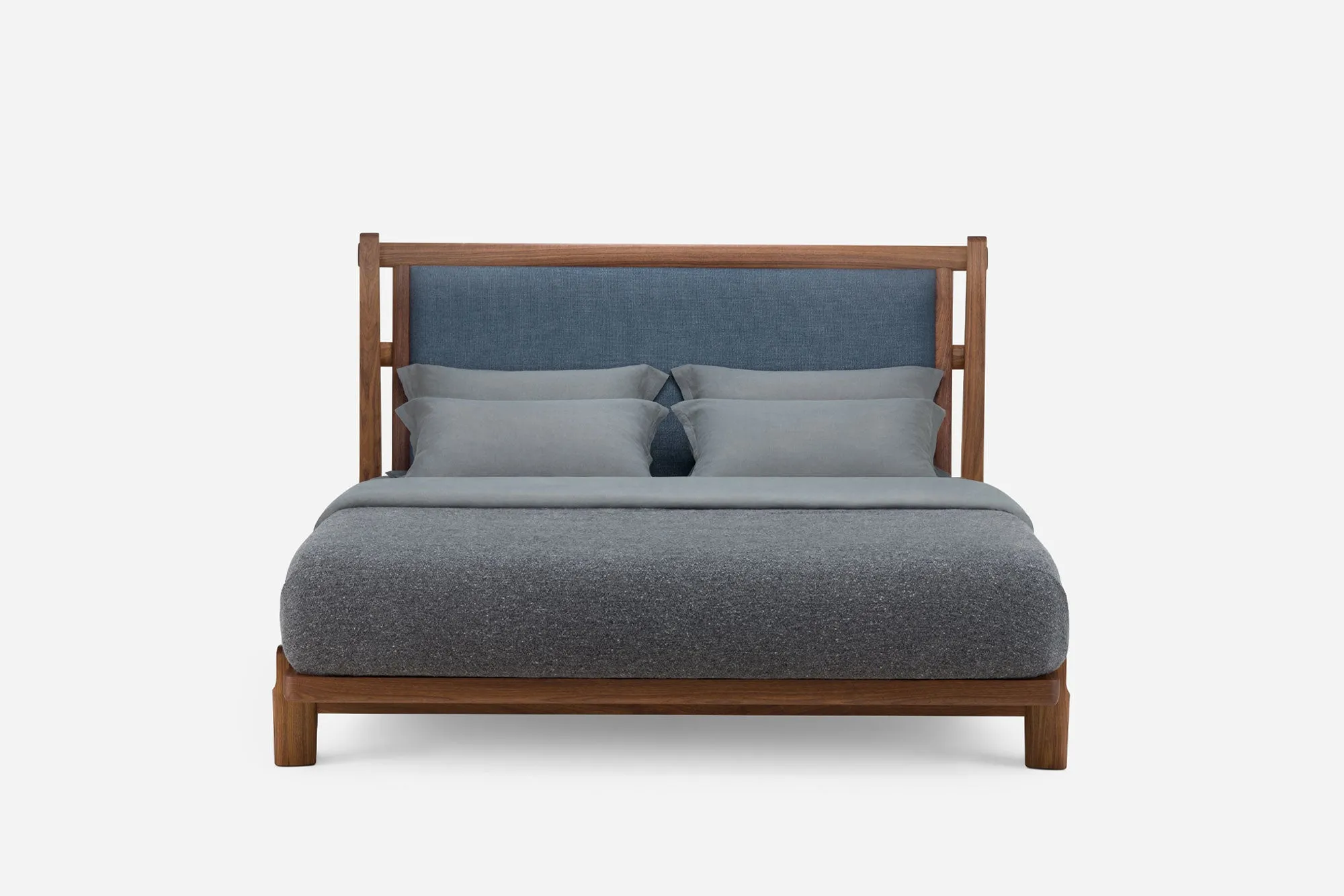 TWENTY-FIVE UPHOLSTERED BED